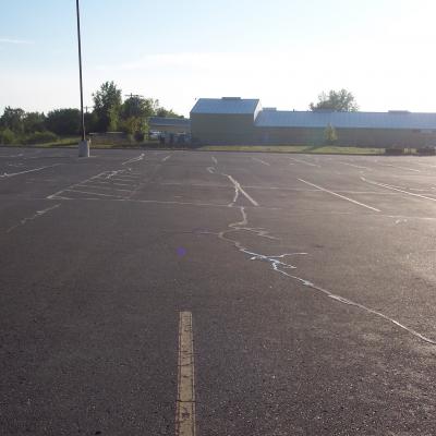 Sealcoating, Crack Sealing and Line Striping at L and M