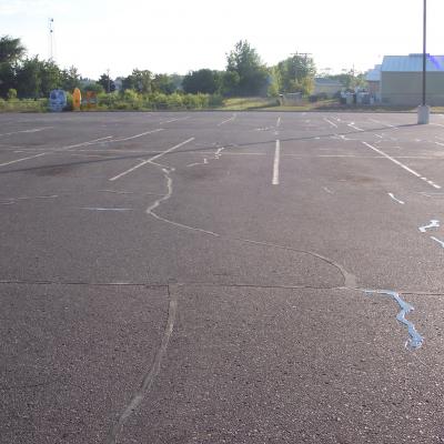 Sealcoating, Crack Sealing and Line Striping at Land M