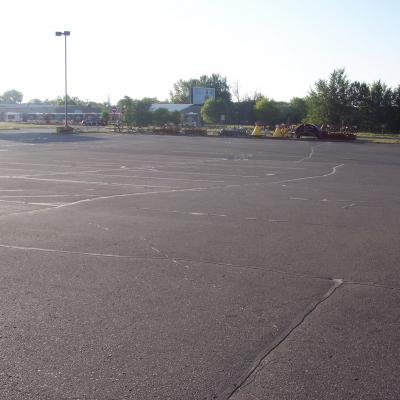 Sealcoating, Crack Sealing and Line Striping at Land M