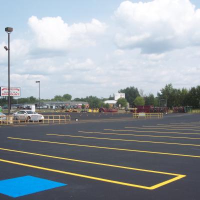 Sealcoating, Crack Sealing and Line Striping at Land M