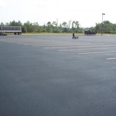 Sealcoating, Crack Sealing and Line Striping at Land M