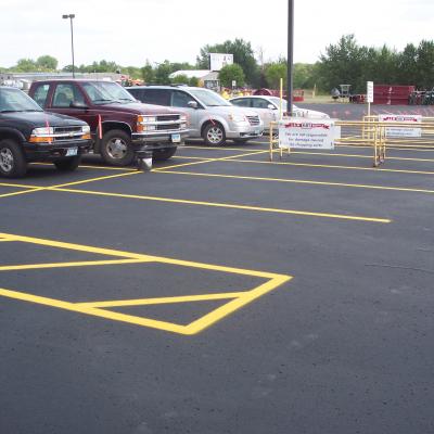 Sealcoating, Crack Sealing and Line Striping at L and M