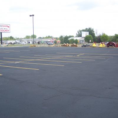 Sealcoating, Crack Sealing and Line Striping at Land M