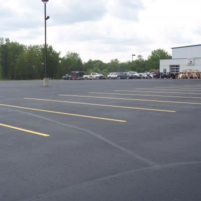 Sealcoating, Crack Sealing and Line Striping at Land M